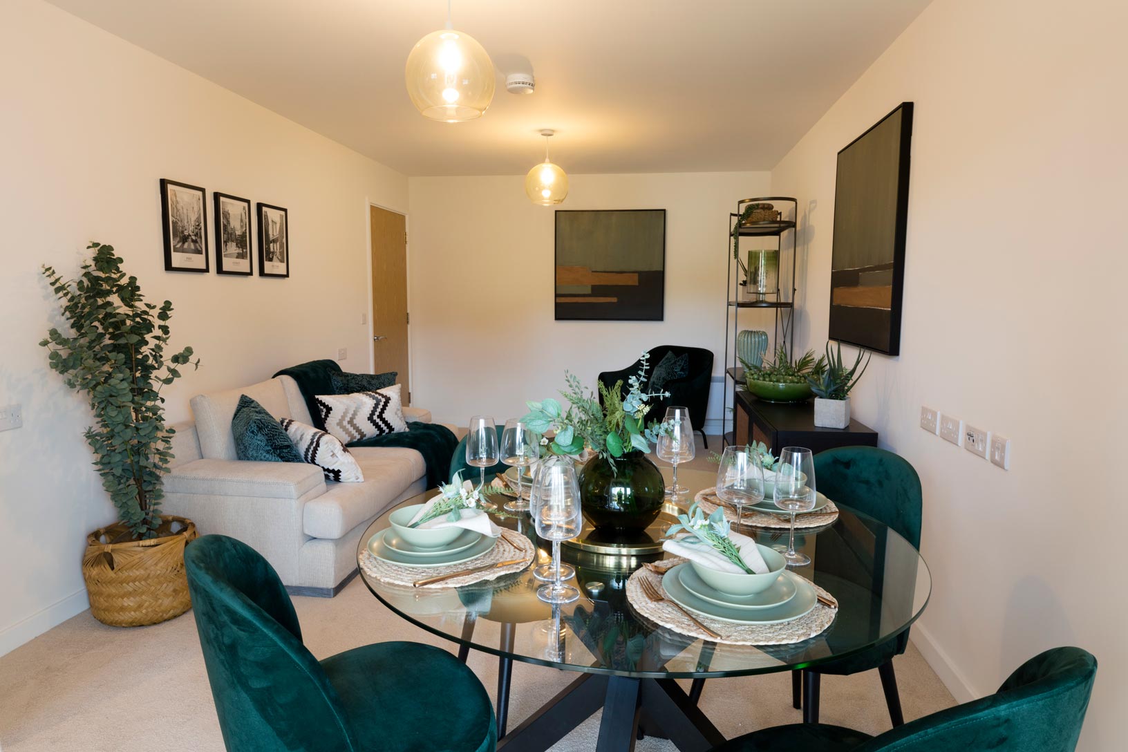 Dining room featuring green chairs and a table.